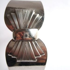 vintage deco chrome bracelet cuff bow design with spring closure